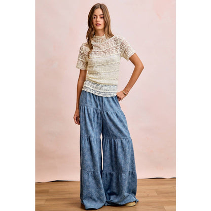 FLORAL TIERED FLARE DENIM PANTS