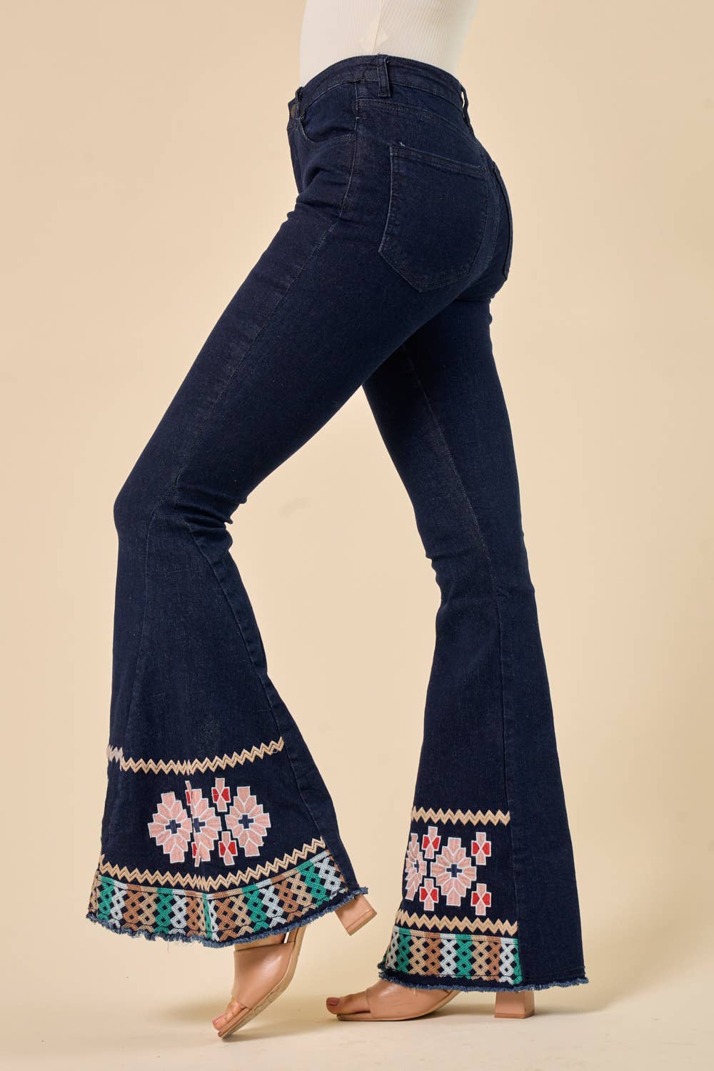 DARK DENIM BELLBOTTOMS WITH EMBROIDERY DETAIL