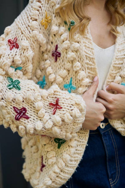 Knitted Cardigan Cross Pom Pom