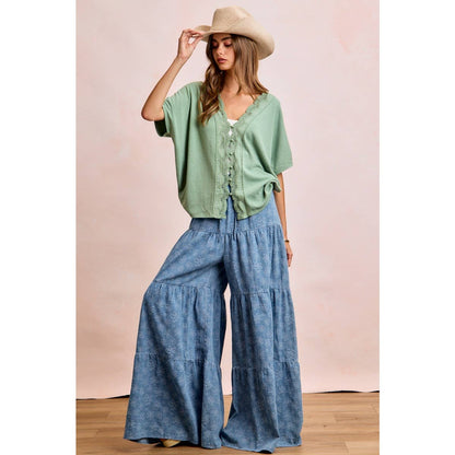 FLORAL TIERED FLARE DENIM PANTS
