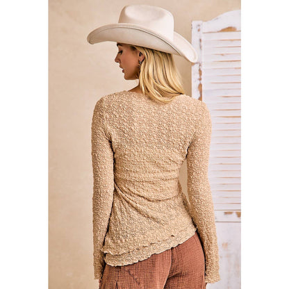 TEXTURED LACE KNIT DIAGONAL HEMLINE BELL SLEEVES TOP